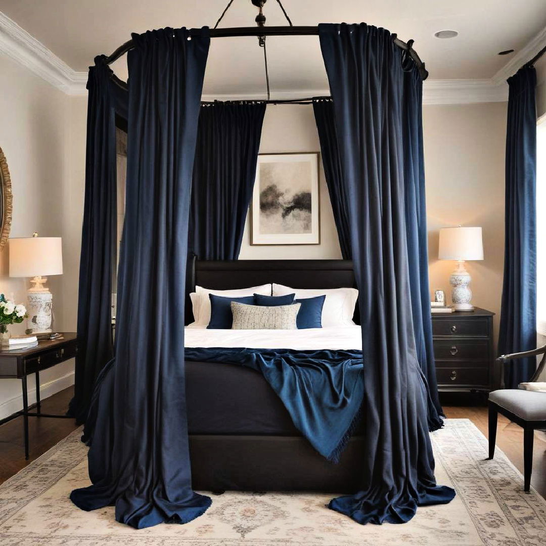 black canopy bed with blue drapes