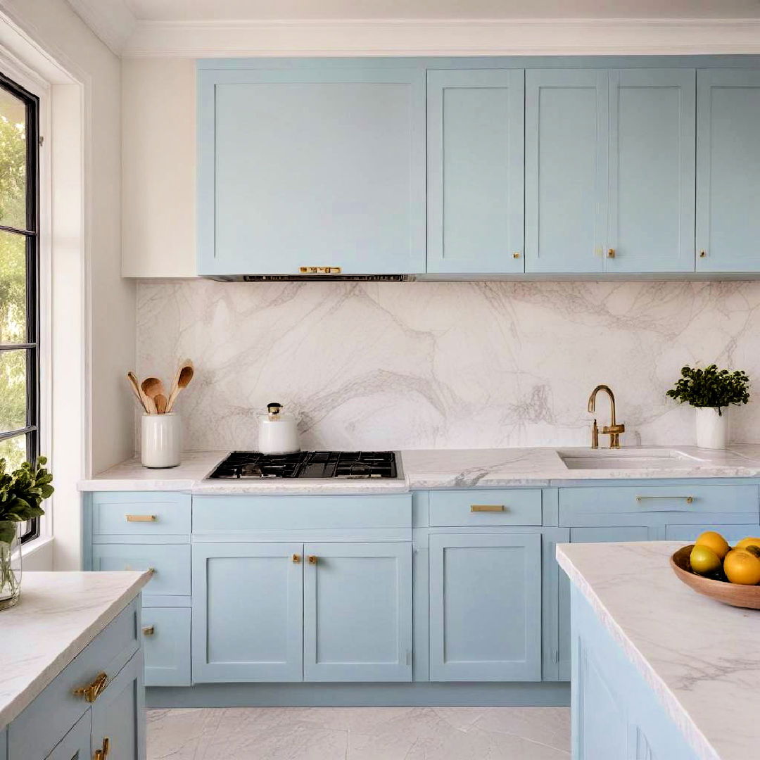 light blue cabinets with white marble countertops