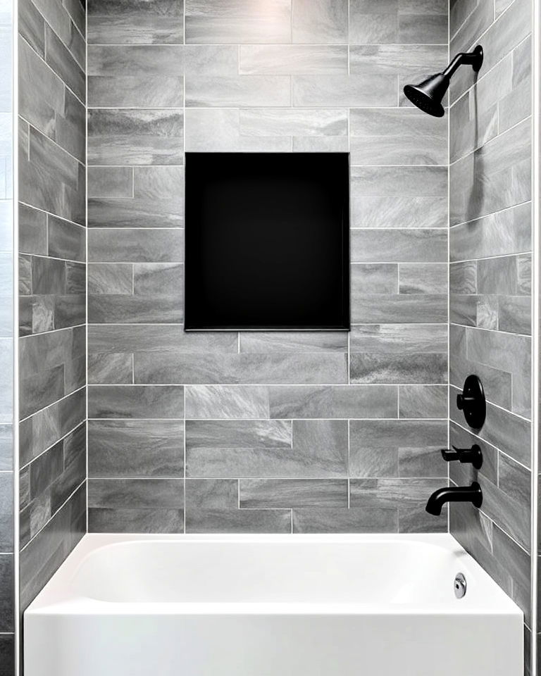 black shower niche with grey tiling