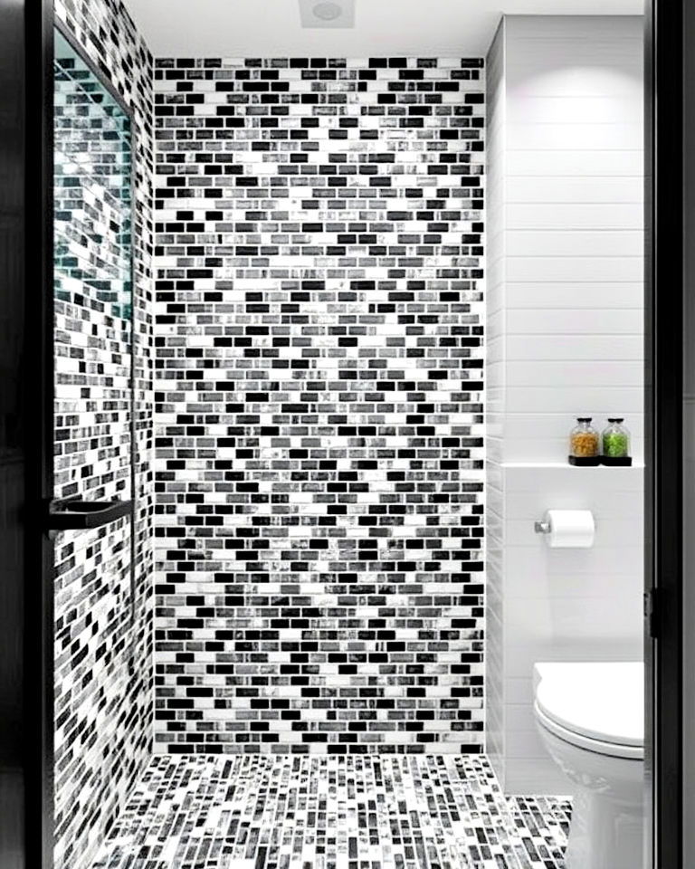 dramatic black and white mosaic bathroom tiles