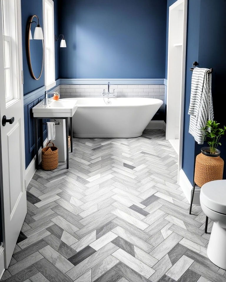 herringbone gray tile layout bathroom