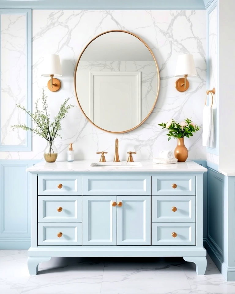 light blue vanity with marble backsplash
