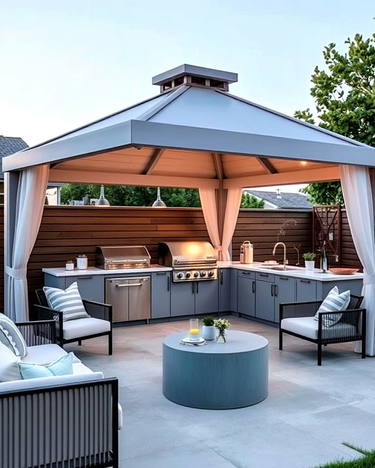 modern gazebo with barbecue island and lounge seating