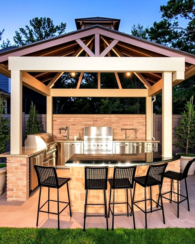 modern gazebo with sleek stainless steel kitchen appliances