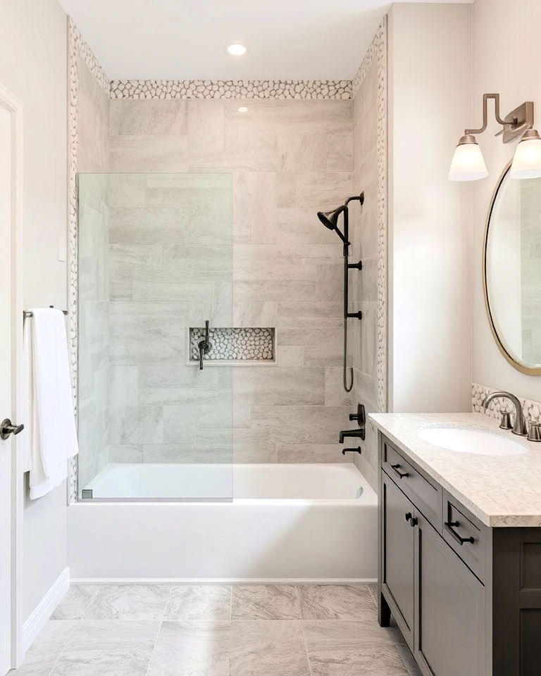 seamless transition bathroom with pebble border