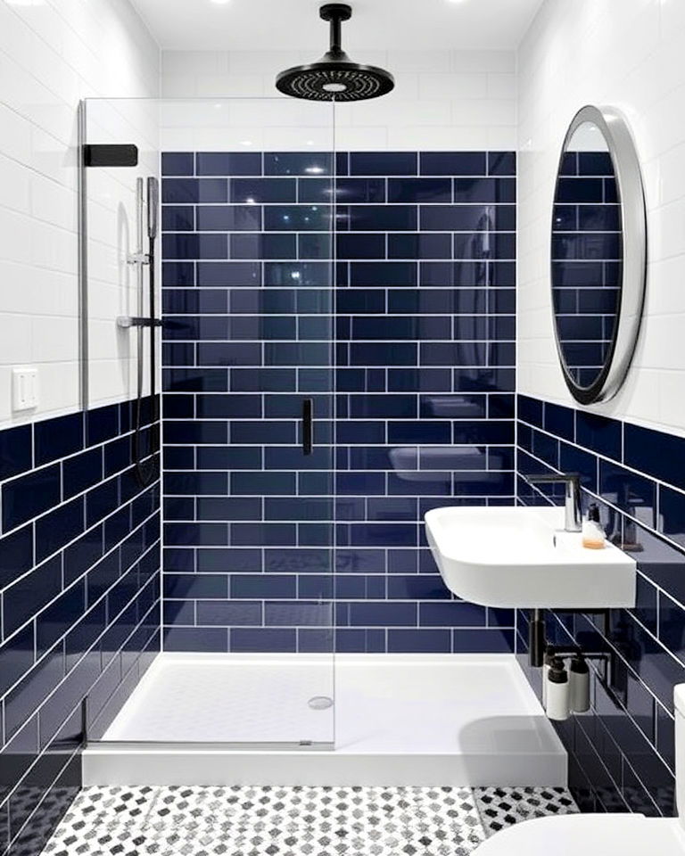 stylish walk in shower with navy and white tiles