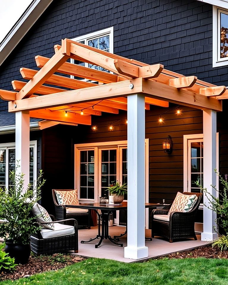 black siding with overhangs and pergola