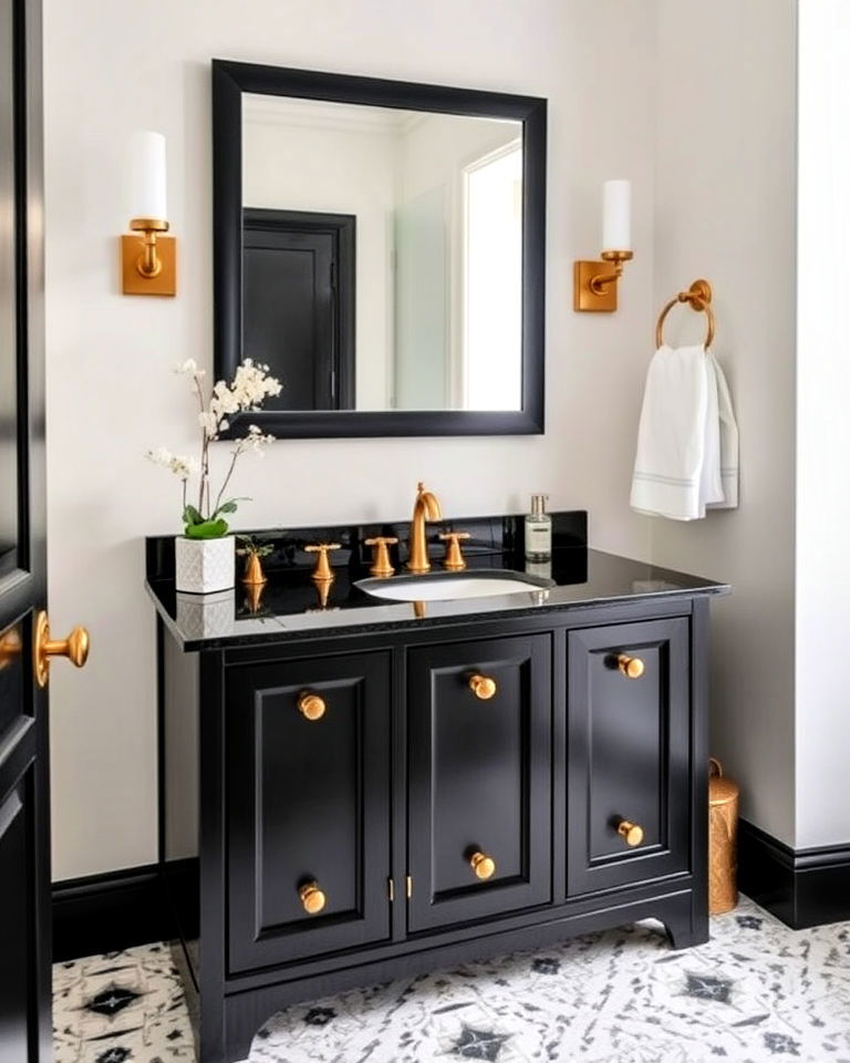black vanity with gold hardware powder room