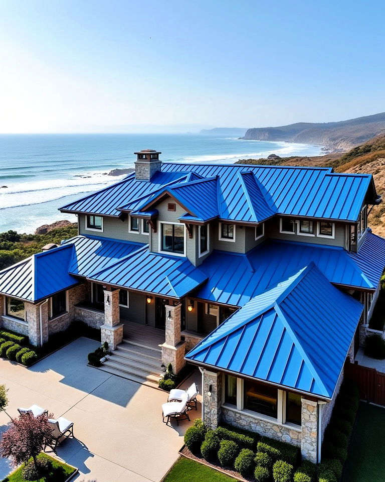 coastal mansion with blue metal roof