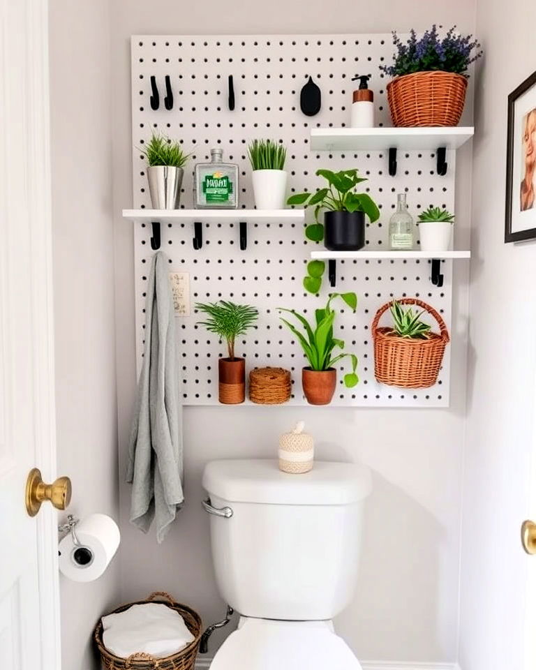 customizable pegboard storage above the toilet