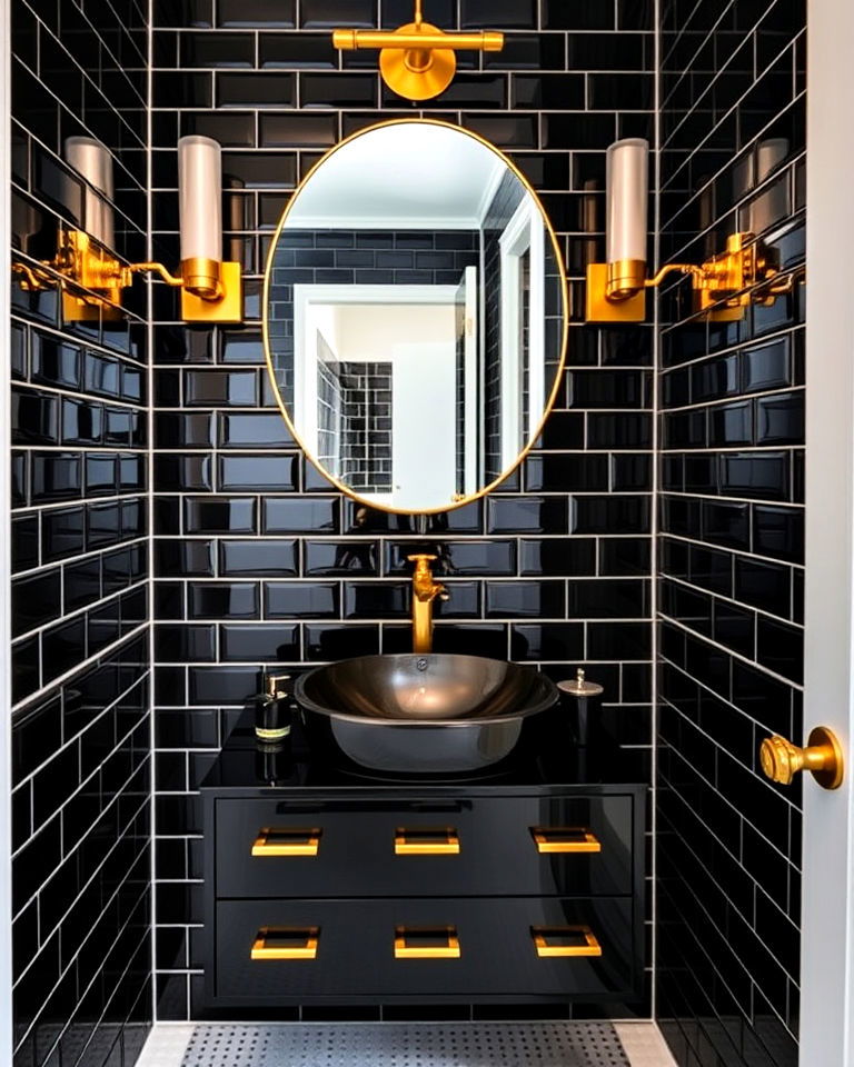 glossy black tiles with gold fixtures powder room