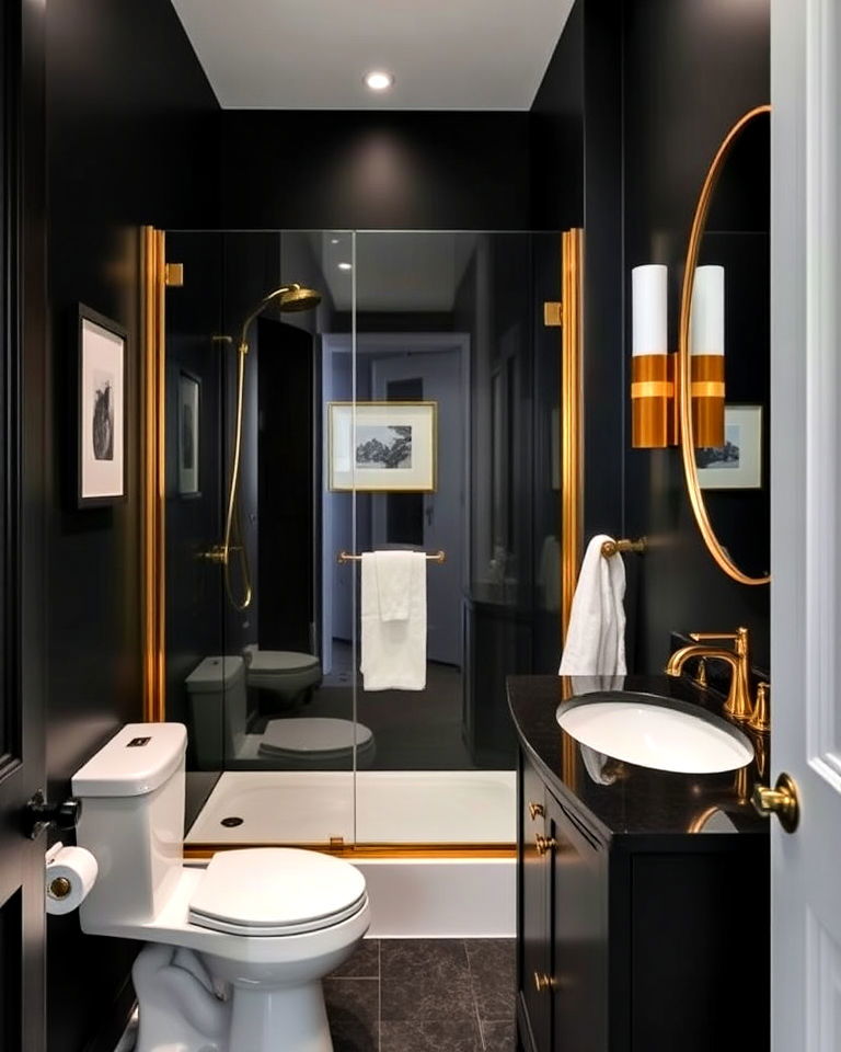gold framed glass shower in a black powder room