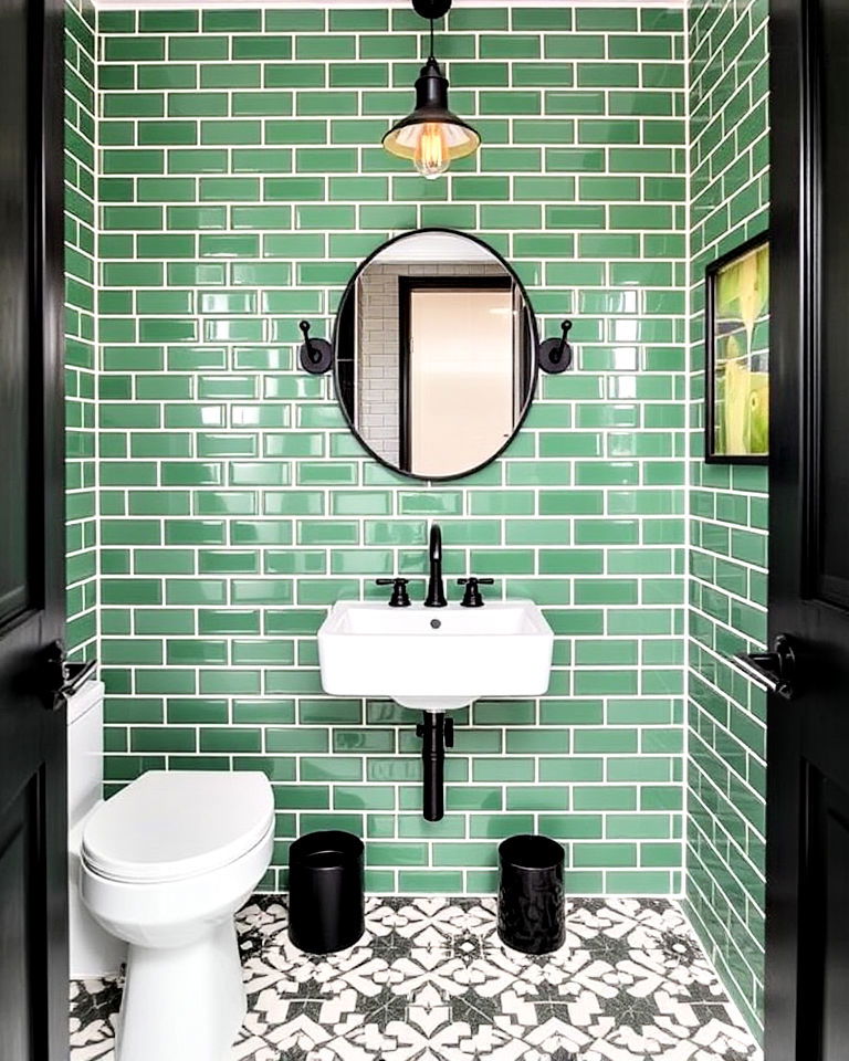 green subway powder room tiles with black fixtures