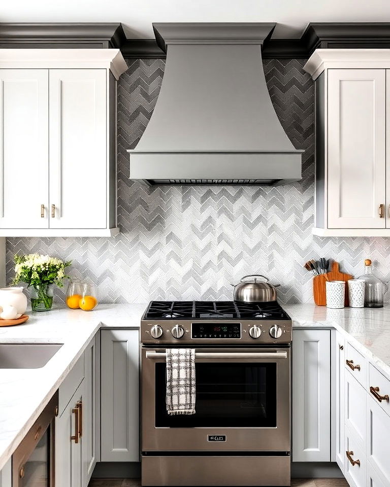 grey and white herringbone patterned kitchen backsplash