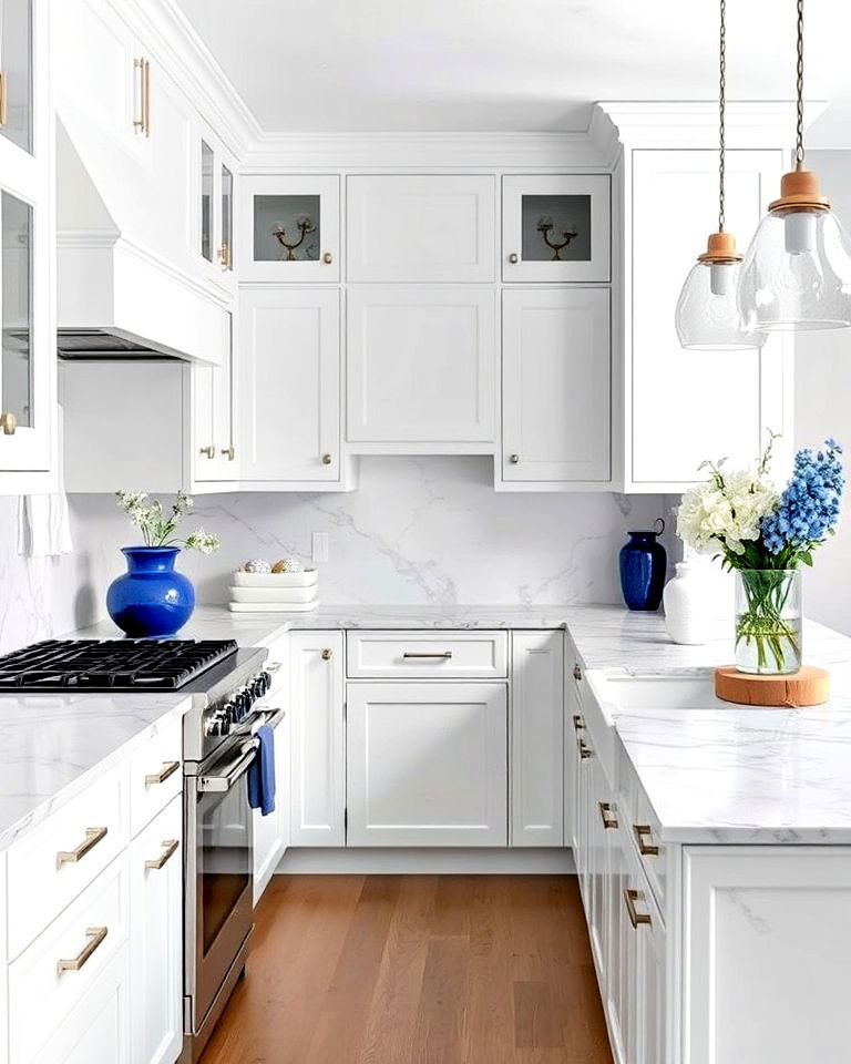 subtle white kitchen countertops with luxe blue veining