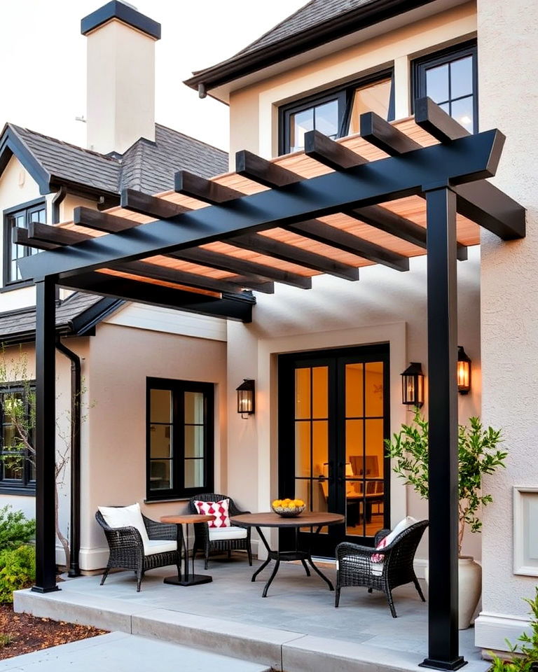 tudor exterior with modern pergola