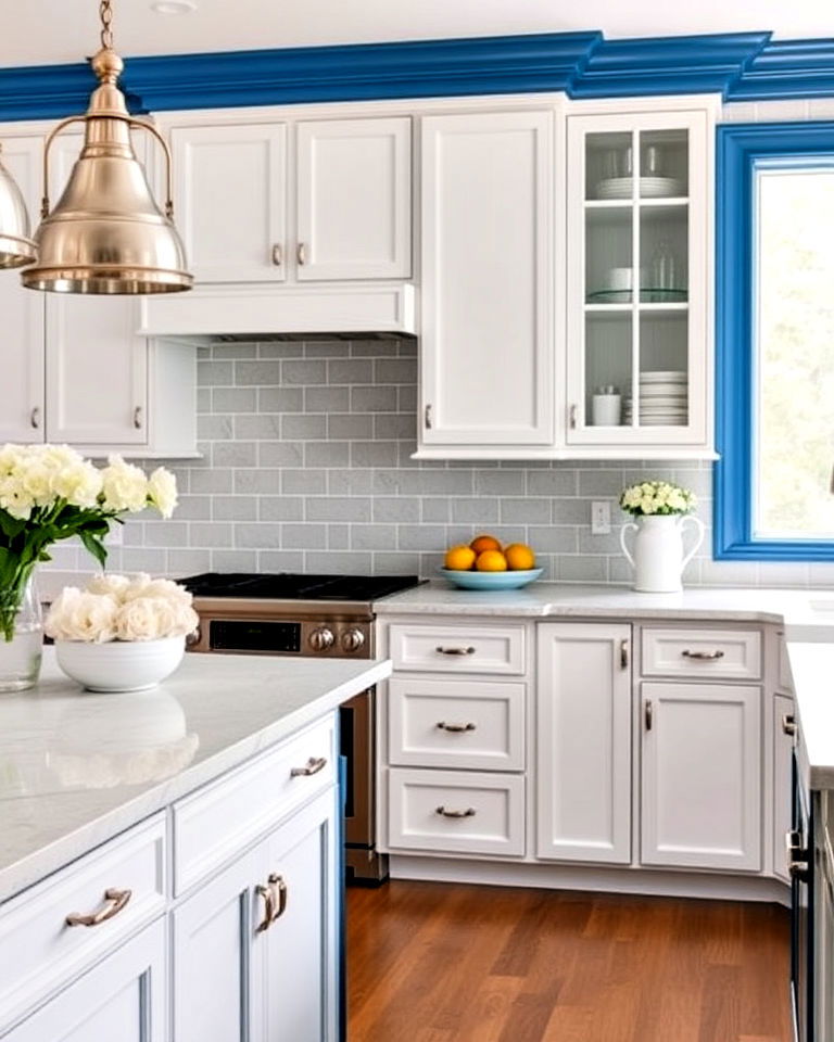 white kitchen cabinets with a subtle blue trim