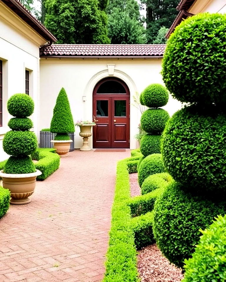 classic topiaries along pathway - 20 Italian Backyard Ideas