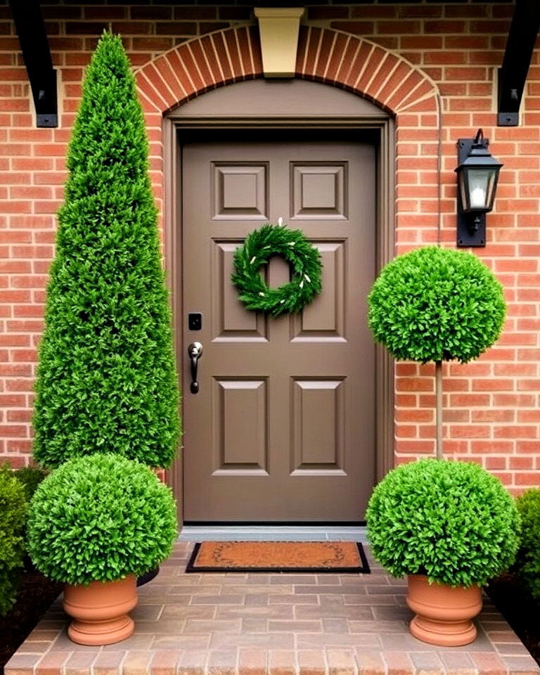frame doorways with boxwood shapes - 25 Boxwood Landscaping Ideas