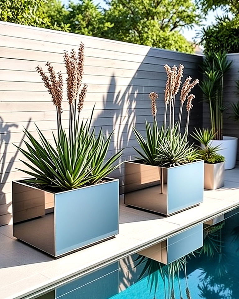 mirrored planters for visual illusion - 25 Pool Planter Ideas