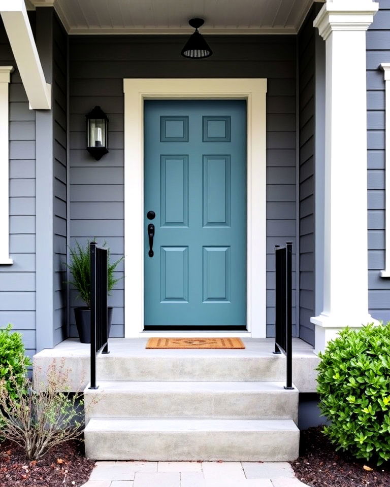 muted teal door to a grey home - 25 Grey House With Blue Door Ideas