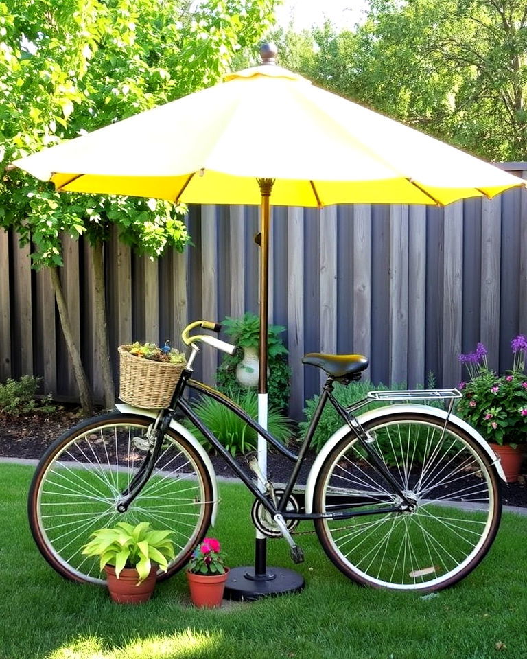 old bicycle as a stand for a garden umbrella - 15 Old Bicycle Garden Ideas