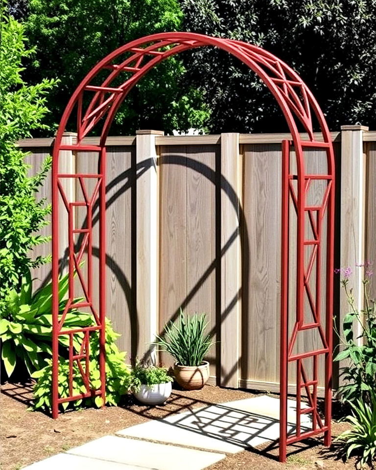 steel arch with geometric patterns - 25 Garden Arch Ideas