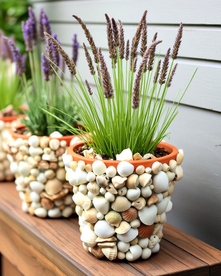 unique shell covered planters garden - 20 Seaside Themed Garden Ideas