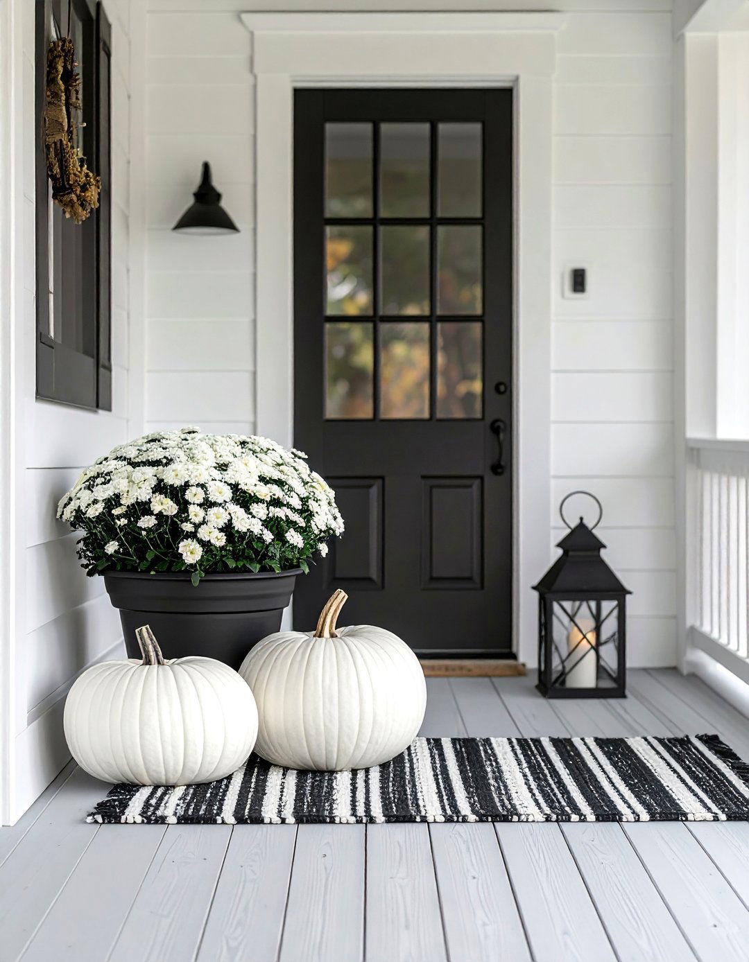 Black and White Accents - 20 modern fall porch decor ideas