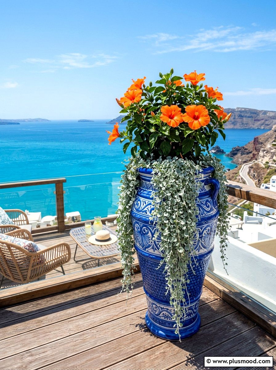 Blue ceramic tall planter - 25 summer tall planter ideas