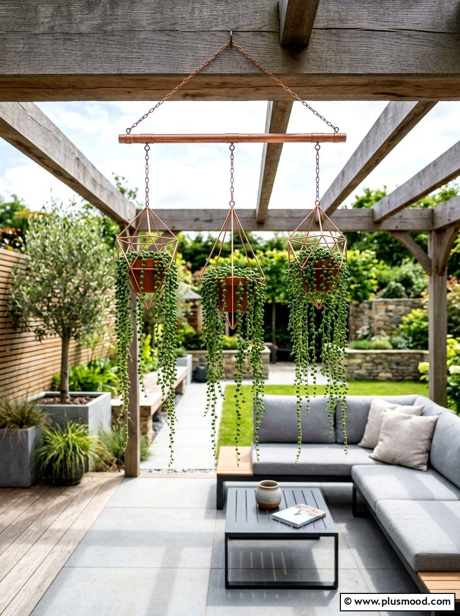 Copper pipe hanging planter - 25 small backyard ideas with hanging plants