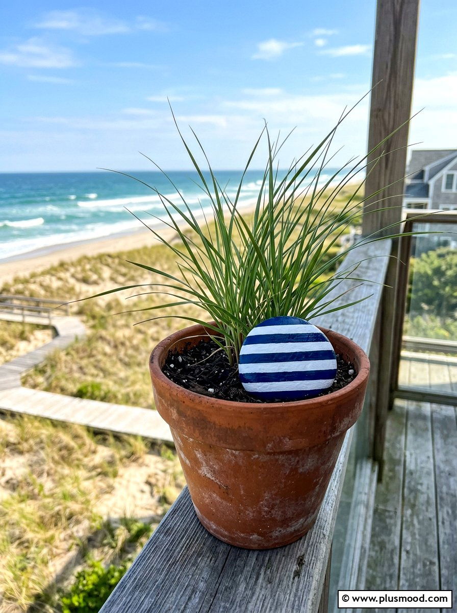 Striped rock decor - 25 painted rock ideas for potted plant display